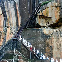Climbing stairs to Sigiriya Sky Palace